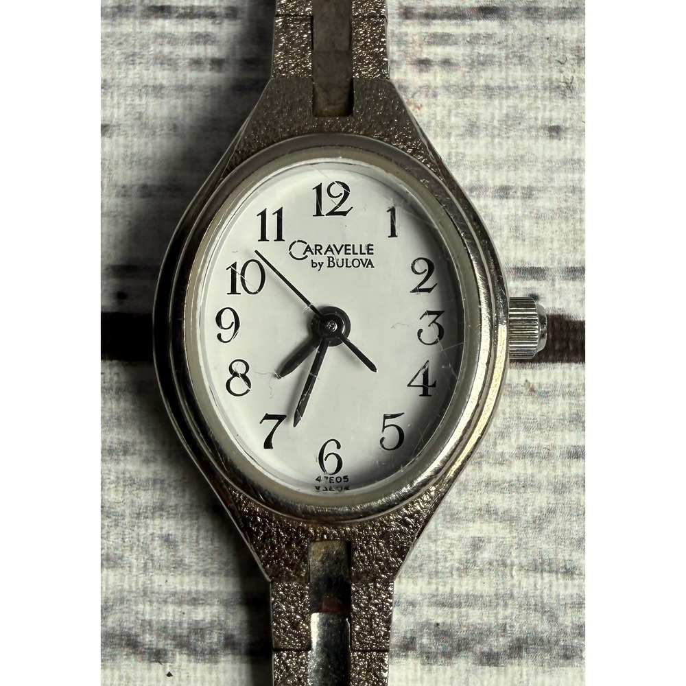 Caravelle by Bulova Womens Watch Silver Tone Oval White Dial Quartz